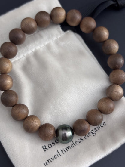 Sandalwood Bead Bracelet with a Tahitian Pearl Peacock Green Circle
