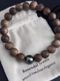 Sandalwood Bead Bracelet with a Tahitian Pearl Peacock Green Circle